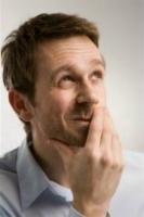 Man pondering web page design.